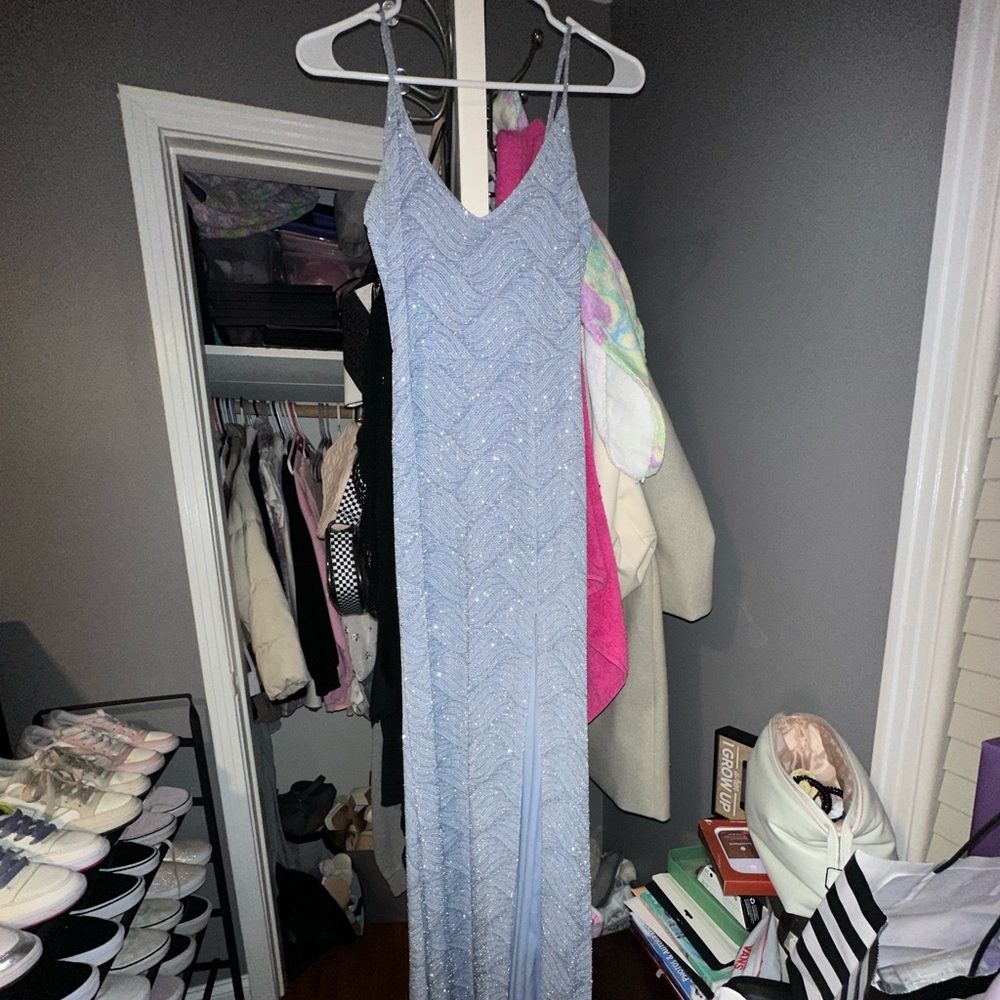 Light blue long glittery dress with a slit on the side